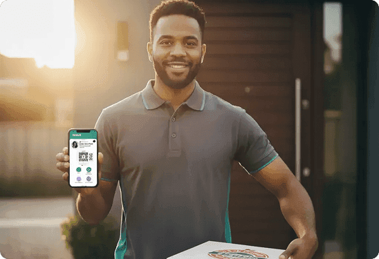 Delivery man holding a package and showing a smartphone app with a QR code
