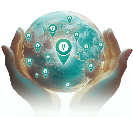 Hands holding a globe dotted with location pins