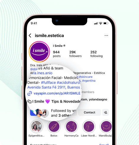 Smartphone showing an Instagram profile for a vacation rental, with a zoomed-in circle highlighting the link in the bio.